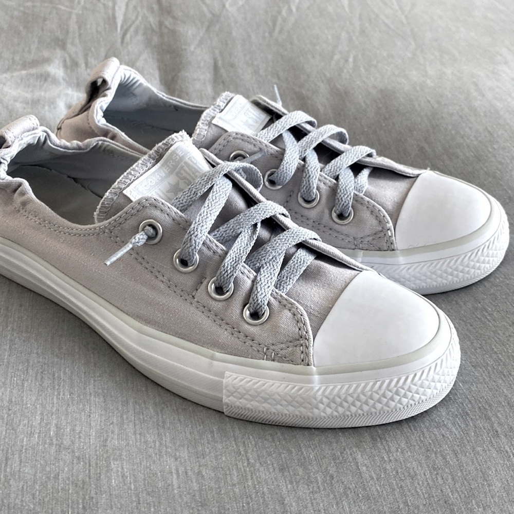 Converse shoes have been Worn and washed and still in good condition light grey